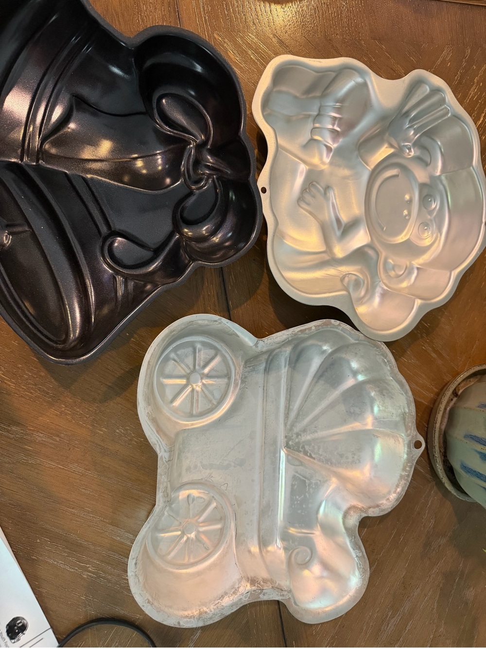 Wilton cake pan Baby Carriage, Monkey, & Bells Cake Pan Set - Silver and Black.